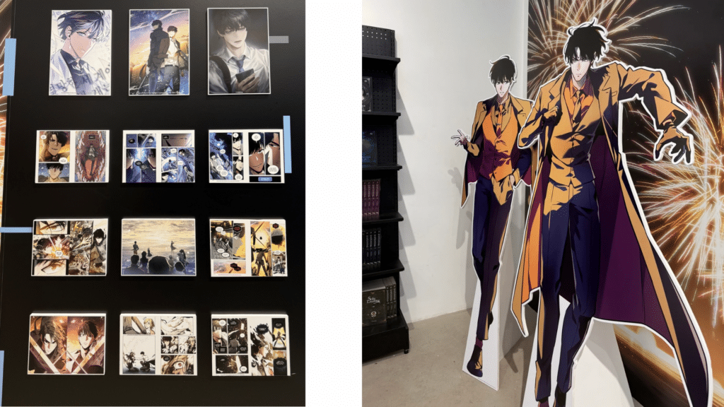 ORV illustrations and comic panels on display beside Kim Dokja and Yu Junghyeok character cutouts at System Sync